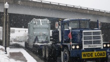 Heavy Load Passing Under Bridge